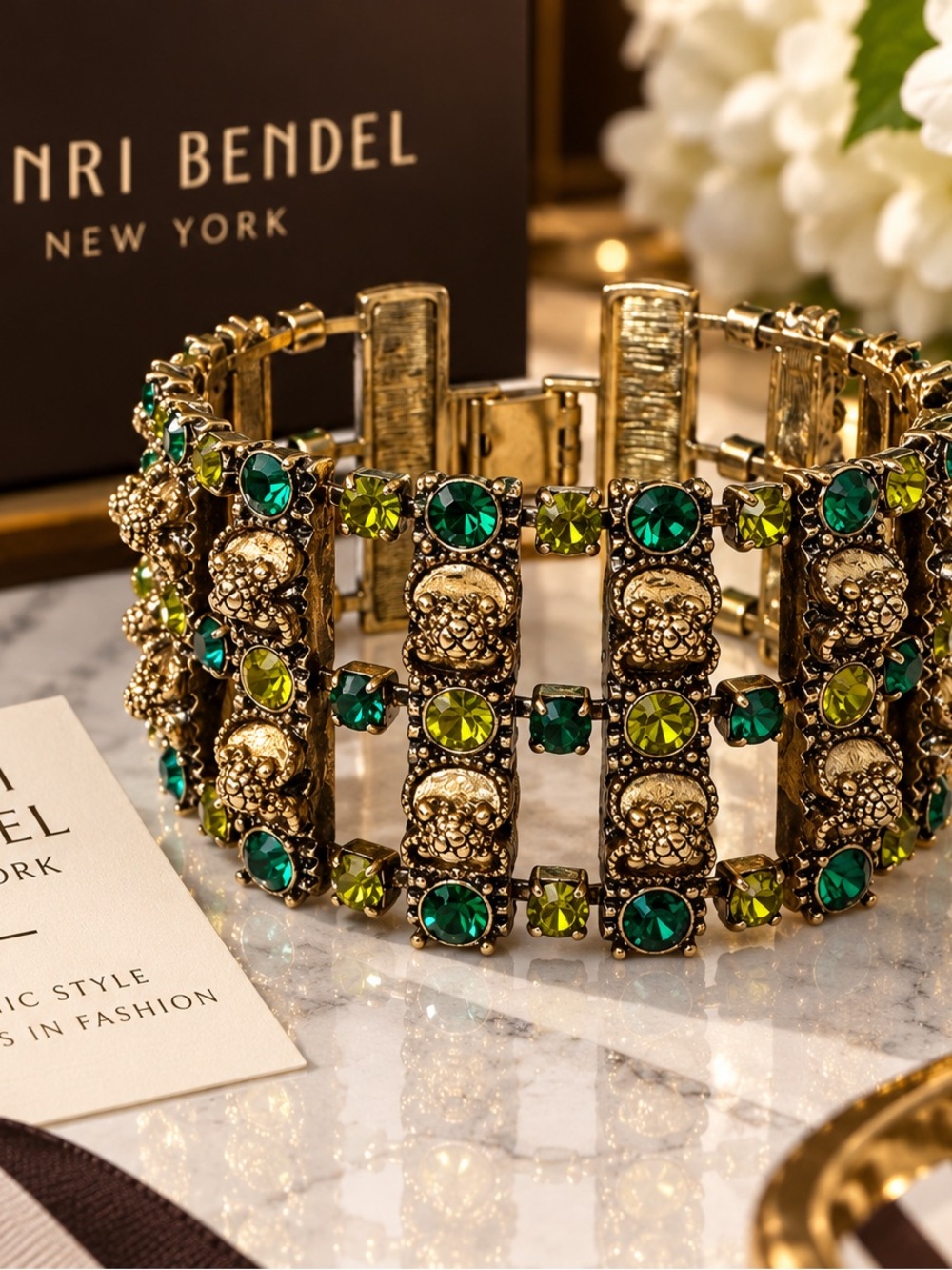 Henri Bendel Gold Bracelet with Emerald and Lime Crystal Accents